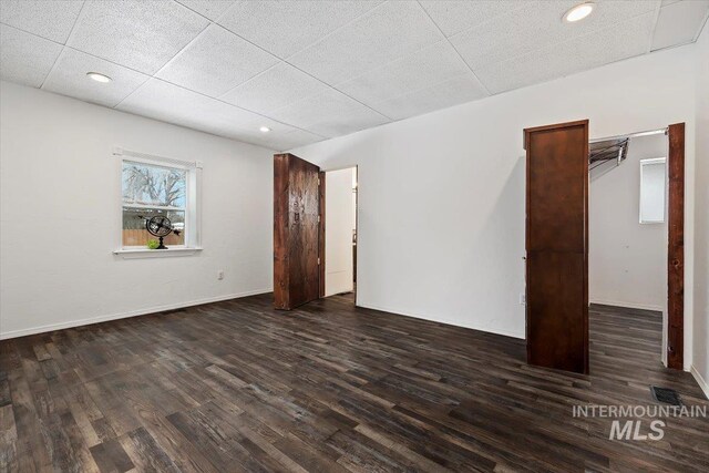 341 Birch St S, Kimberly, ID 83341 - unfurnished bedroom featuring dark wood-type flooring, recessed lighting, and baseboards