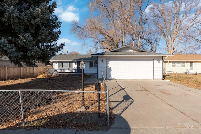 ranch-style home with a garage