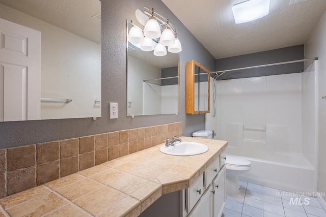 bathroom featuring toilet, a textured ceiling, shower / tub combination, vanity, and tile patterned floors