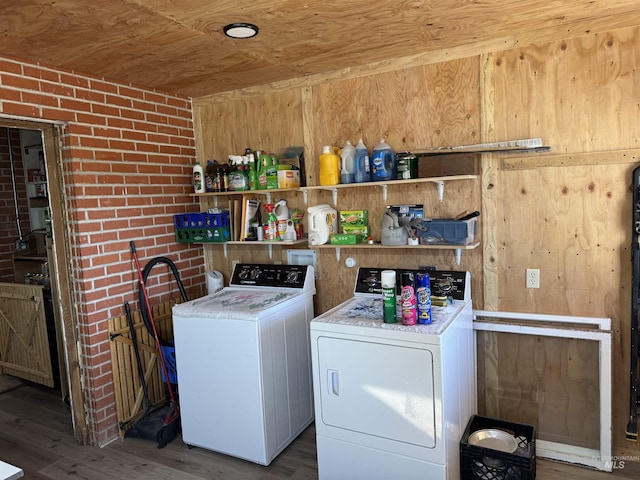 145 N Lincoln, Oakley, ID 83346 - laundry room featuring wood finished floors, brick wall, laundry area, wood ceiling, and independent washer and dryer