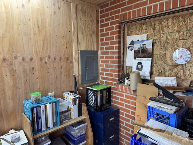 145 N Lincoln, Oakley, ID 83346 - misc room with electric panel and brick wall