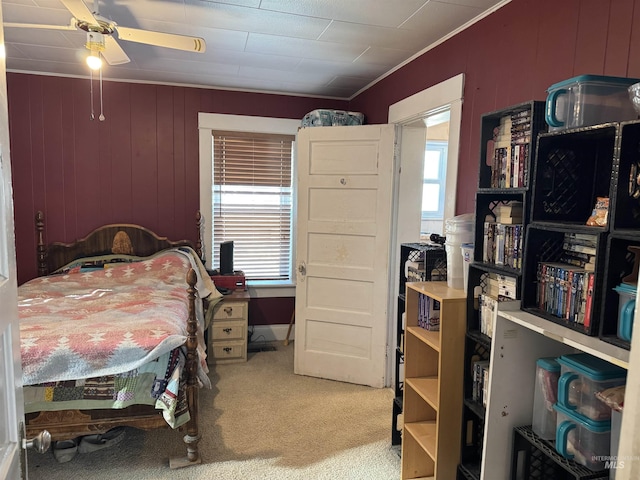 145 N Lincoln, Oakley, ID 83346 - bedroom featuring light carpet, wooden walls, and ornamental molding