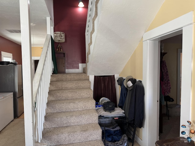 145 N Lincoln, Oakley, ID 83346 - stairs with carpet and visible vents