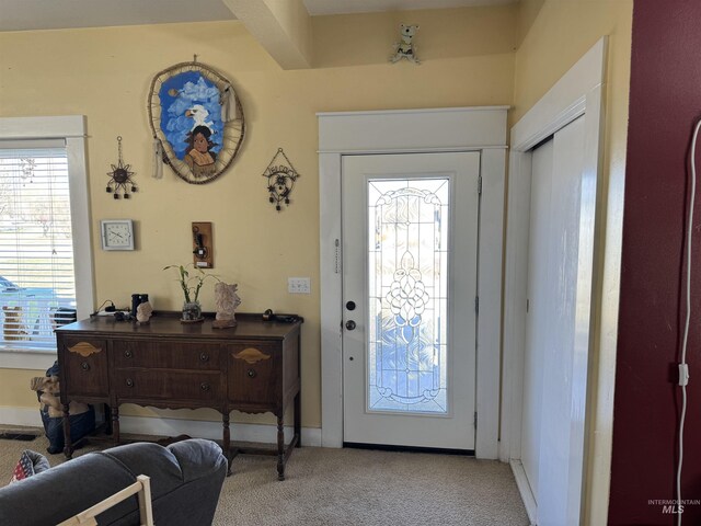 145 N Lincoln, Oakley, ID 83346 - entryway featuring visible vents, baseboards, and light colored carpet