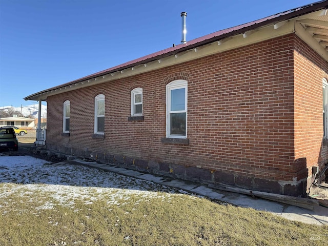 145 N Lincoln, Oakley, ID 83346 - view of home's exterior with brick siding and metal roof