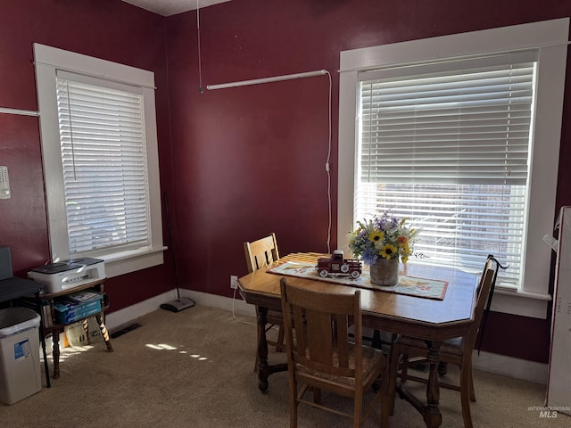 145 N Lincoln, Oakley, ID 83346 - carpeted dining space with visible vents and baseboards