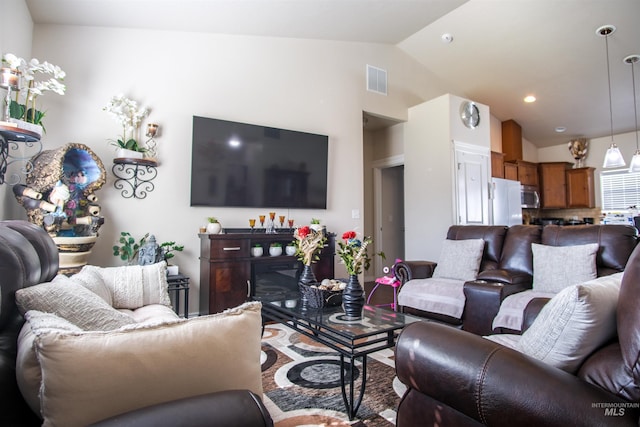 living room with vaulted ceiling