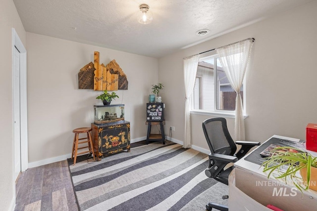 12339 W Foxhaven St, Star, ID 83669 - office space featuring a textured ceiling and baseboards