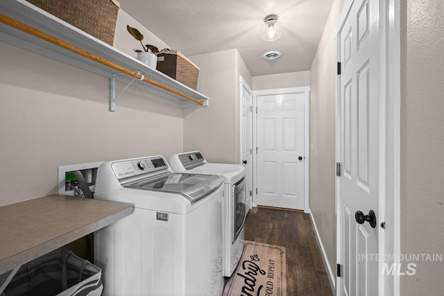 12339 W Foxhaven St, Star, ID 83669 - washroom with separate washer and dryer and dark wood-type flooring