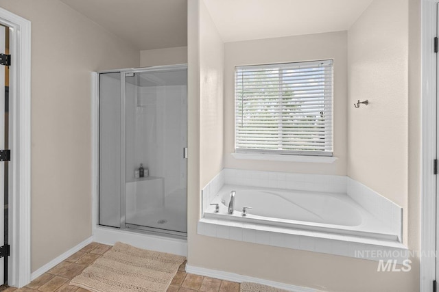 12339 W Foxhaven St, Star, ID 83669 - bathroom featuring a shower stall and a garden tub