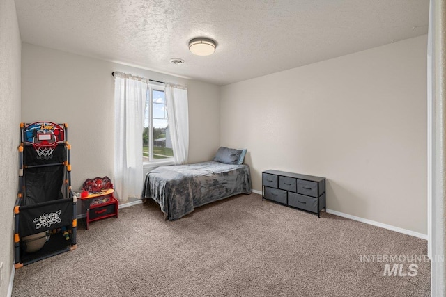12339 W Foxhaven St, Star, ID 83669 - carpeted bedroom featuring a textured ceiling