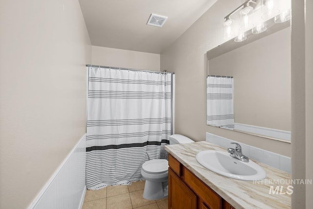 12339 W Foxhaven St, Star, ID 83669 - bathroom featuring vanity, tile patterned flooring, and a shower with curtain