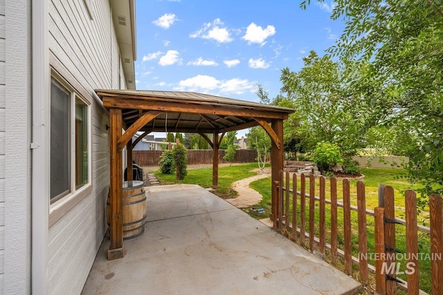 12339 W Foxhaven St, Star, ID 83669 - fenced backyard with a gazebo and a patio area