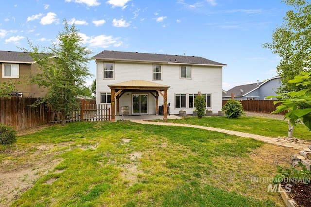 12339 W Foxhaven St, Star, ID 83669 - back of property with a gazebo, a patio, and a fenced backyard