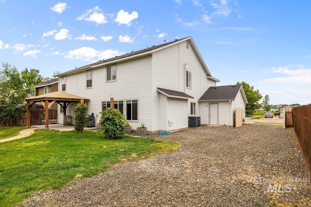 12339 W Foxhaven St, Star, ID 83669 - back of house featuring a gazebo, a patio area, and driveway