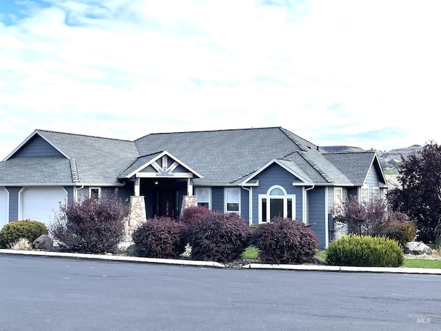2655 13th St, Clarkston, WA 99403 - view of front of house featuring an attached garage and a shingled roof