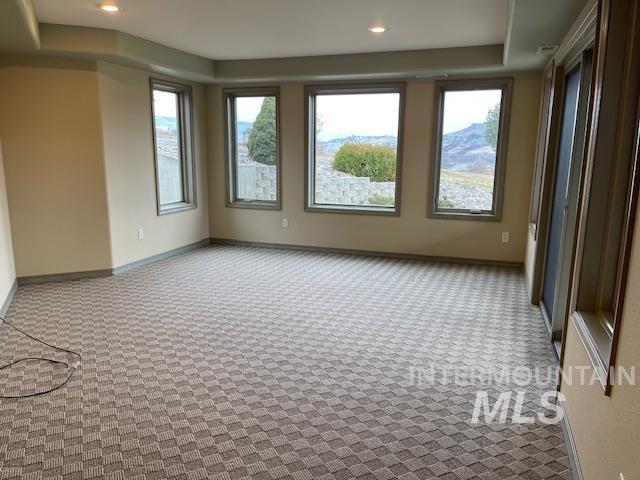 2655 13th St, Clarkston, WA 99403 - carpeted spare room with baseboards and recessed lighting