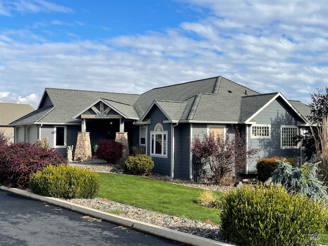 view of front of property with a front lawn