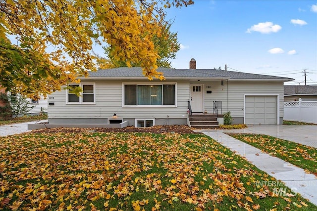 ranch-style home with a garage