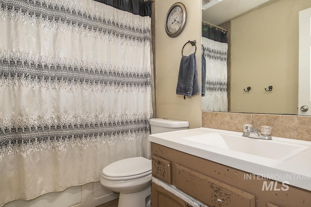 bathroom with vanity and toilet