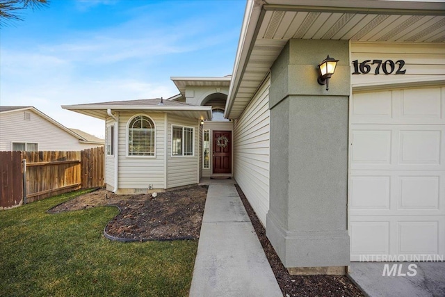 16702 Frisco Ave, Caldwell, ID 83607 - entrance to property with a garage