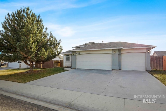 16702 Frisco Ave, Caldwell, ID 83607 - ranch-style house featuring driveway and a garage