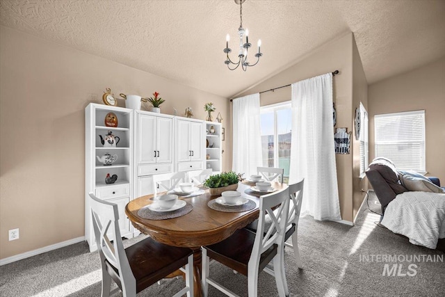 16702 Frisco Ave, Caldwell, ID 83607 - carpeted dining space featuring a chandelier, lofted ceiling, a textured ceiling, and baseboards