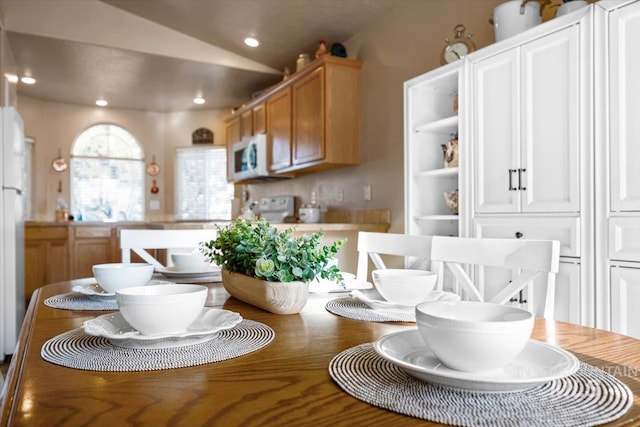 16702 Frisco Ave, Caldwell, ID 83607 - dining space with vaulted ceiling and recessed lighting