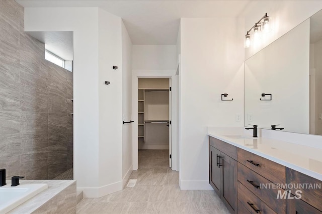 bathroom with vanity and tile patterned flooring