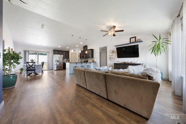 2026 Kelly Dr, Payette, ID 83661 - living room featuring a ceiling fan, lofted ceiling, dark wood-style flooring, and recessed lighting