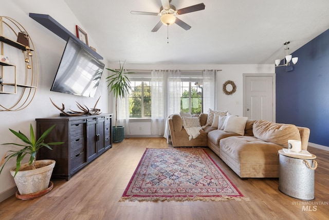 2026 Kelly Dr, Payette, ID 83661 - living area featuring a ceiling fan, light wood-type flooring, and baseboards