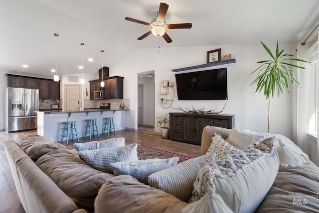 2026 Kelly Dr, Payette, ID 83661 - living room with ceiling fan, wood finished floors, lofted ceiling, recessed lighting, and baseboards