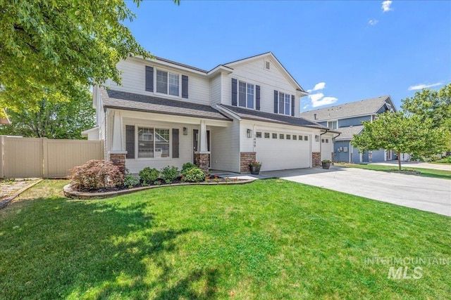 1499 E Sicily St, Meridian, ID 83642 - view of front of property with a garage, concrete driveway, and stone siding