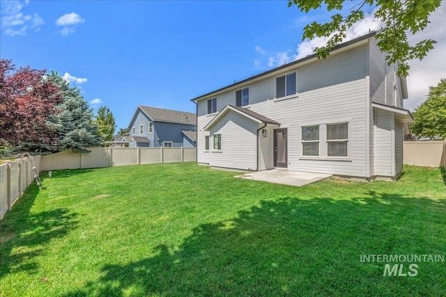1499 E Sicily St, Meridian, ID 83642 - back of property featuring a fenced backyard and a patio