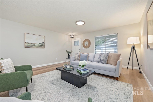 1499 E Sicily St, Meridian, ID 83642 - living room with wood finished floors and baseboards
