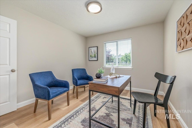 1499 E Sicily St, Meridian, ID 83642 - home office with light wood-style flooring