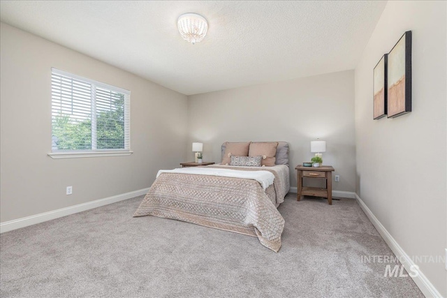 1499 E Sicily St, Meridian, ID 83642 - carpeted bedroom with baseboards and a textured ceiling