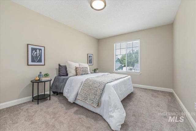 1499 E Sicily St, Meridian, ID 83642 - bedroom with light colored carpet and a textured ceiling