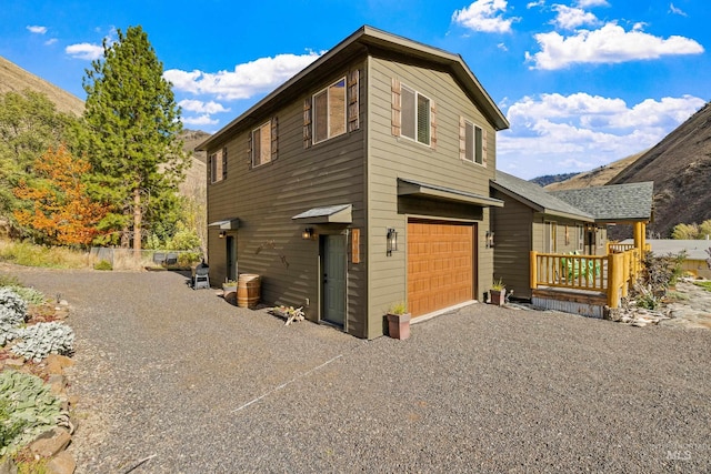 view of side of property featuring a garage