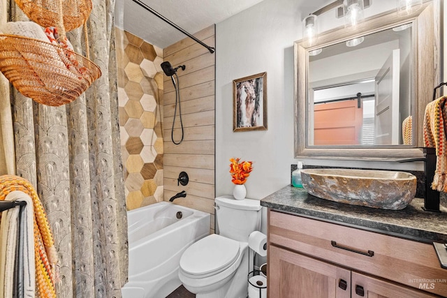 full bathroom featuring vanity, toilet, and shower / bath combo with shower curtain