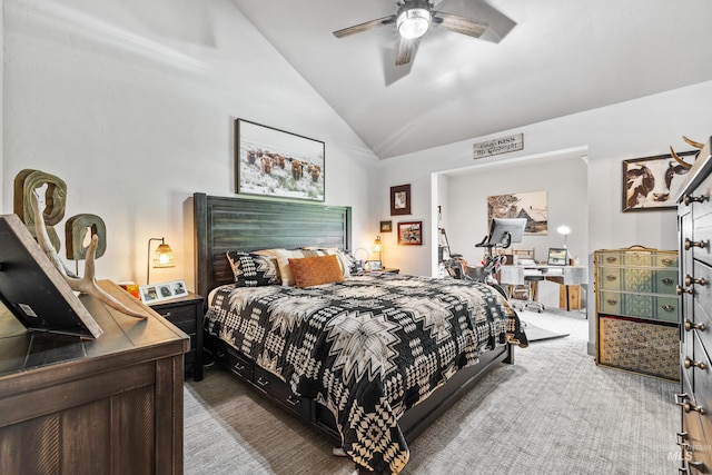 bedroom with vaulted ceiling, ceiling fan, and carpet flooring