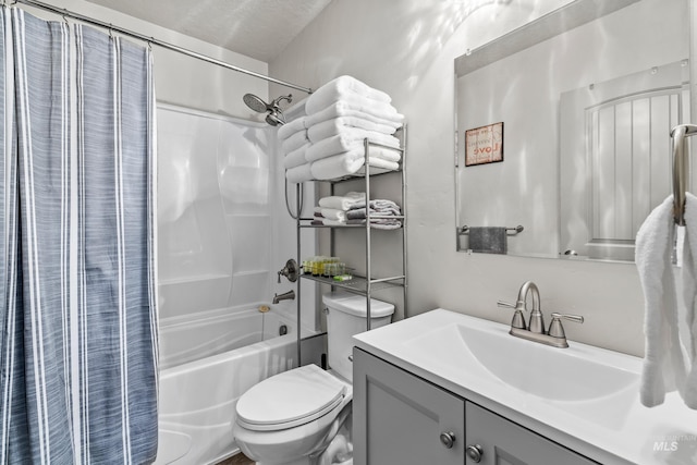 full bathroom with shower / bathtub combination with curtain, vanity, and toilet