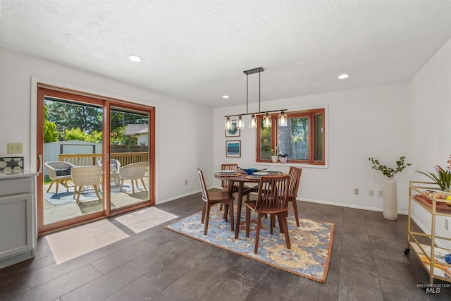 1913 W Suncrest Dr, Boise, ID 83705 - dining area featuring recessed lighting, a textured ceiling, and baseboards