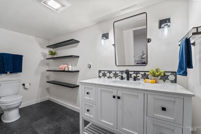 1913 W Suncrest Dr, Boise, ID 83705 - bathroom with vanity, toilet, and baseboards