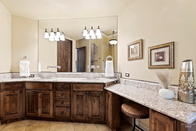 full bathroom with tile patterned floors and double vanity
