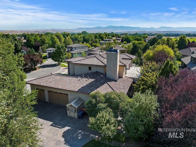 view of subject property with a mountainous background