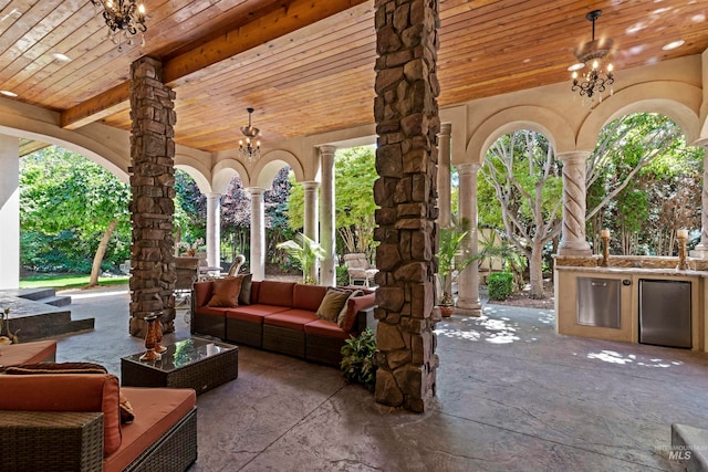 view of patio featuring an outdoor kitchen and an outdoor hangout area