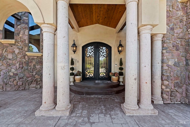 view of exterior entry with stone siding