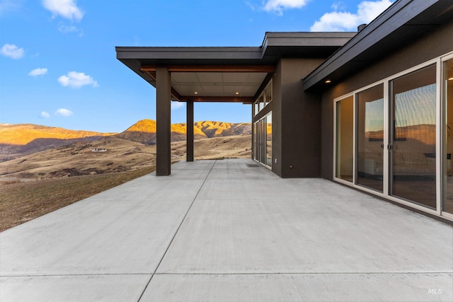 view of patio with a mountain view