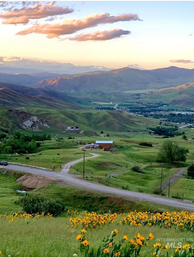 view of mountain feature with a rural view